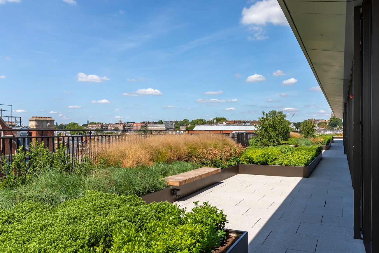 Roof terrace design porcelain decking and planters