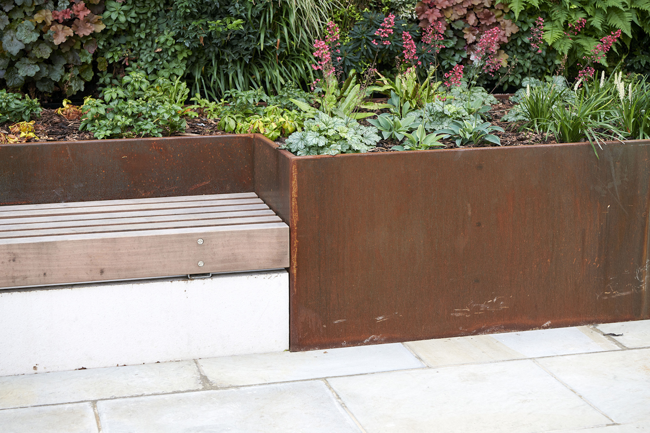 Timber bench and corten steel planter at 245 Hammersmith