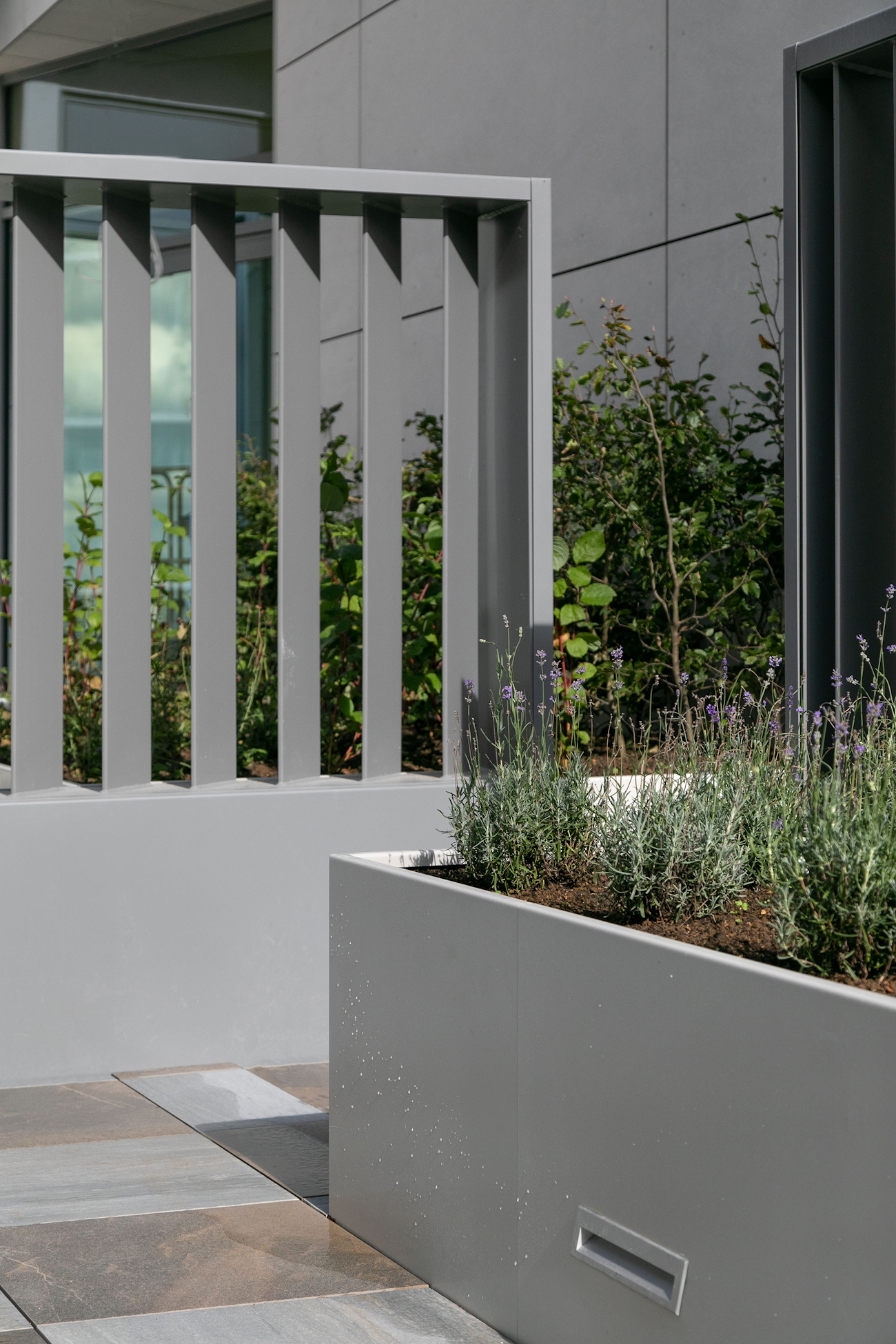 Porcelain Tiles and Straight Wall Planters at Vega Roof Terrace, Miles Street